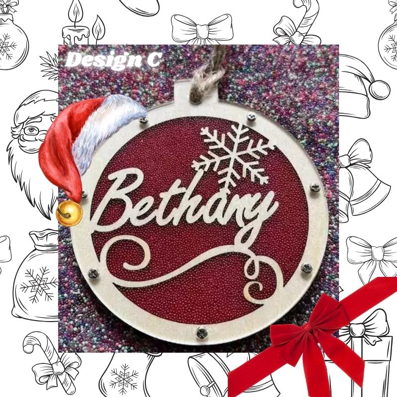Decorative Christmas ornament with 'Bethany' and a Santa hat on a red background, surrounded by black line art of Christmas elements.