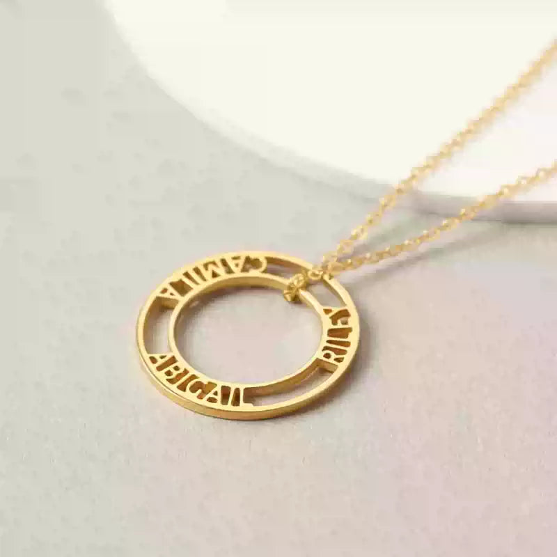 Gold necklace with a circular pendant on a light gray background. Stainless Steel Name Jewelry. Custom Gift-Personalized. gift for boyfriend / girlfriend. long-distance relationship gift meaningful keepsake. Memory gift. Christmas couple gift. Birthday Gift. Bubble Name Necklace