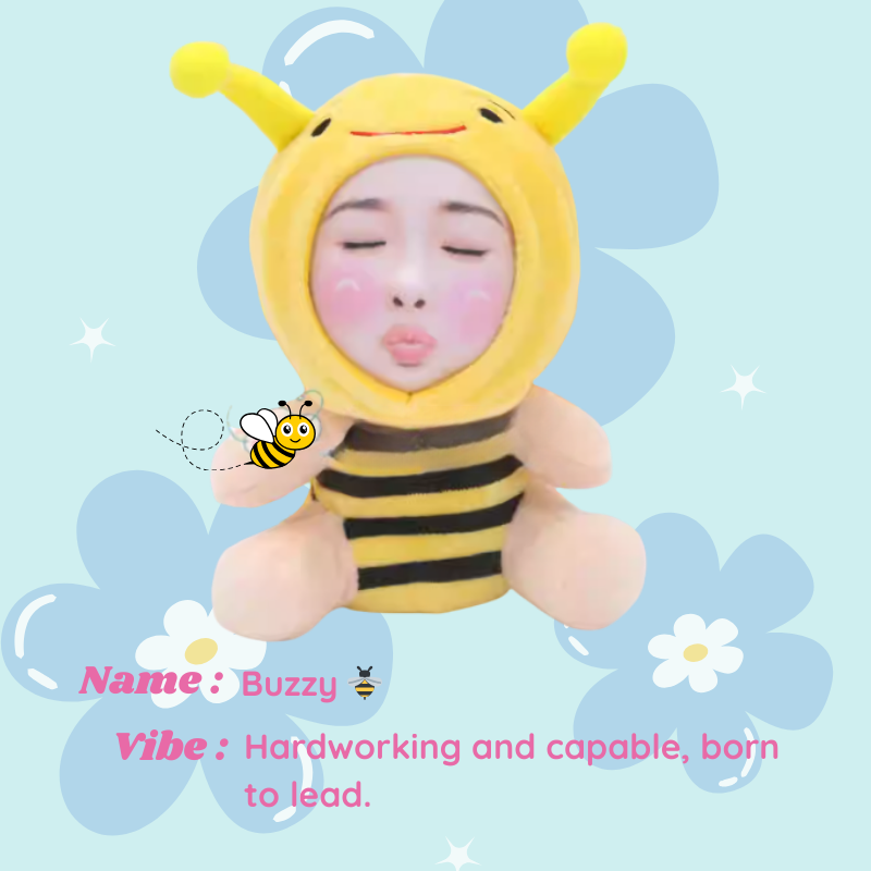 Plush toy bee character with a child's face, on a light blue background with flowers and text. Buzzy - Bee. Vibe : Hardworking and capable, born to lead. Custom Gift-Personalized Talking Photo Keychain, gift for couples, ift for boyfriend / girlfriend long-distance relationship gift meaningful keepsake
