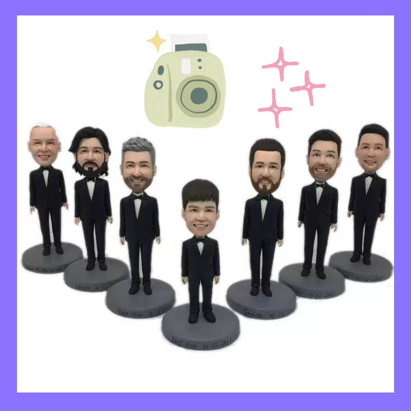 Set of seven bobblehead figures in black suits with a camera and stars graphic on a white background. Personalized couple present. Gift for boyfriend girlfriend. Custom-made. Personalized. Perfect gift idea. Meaningful keepsake. Wedding gift. Anniversary gift. Birthday gift