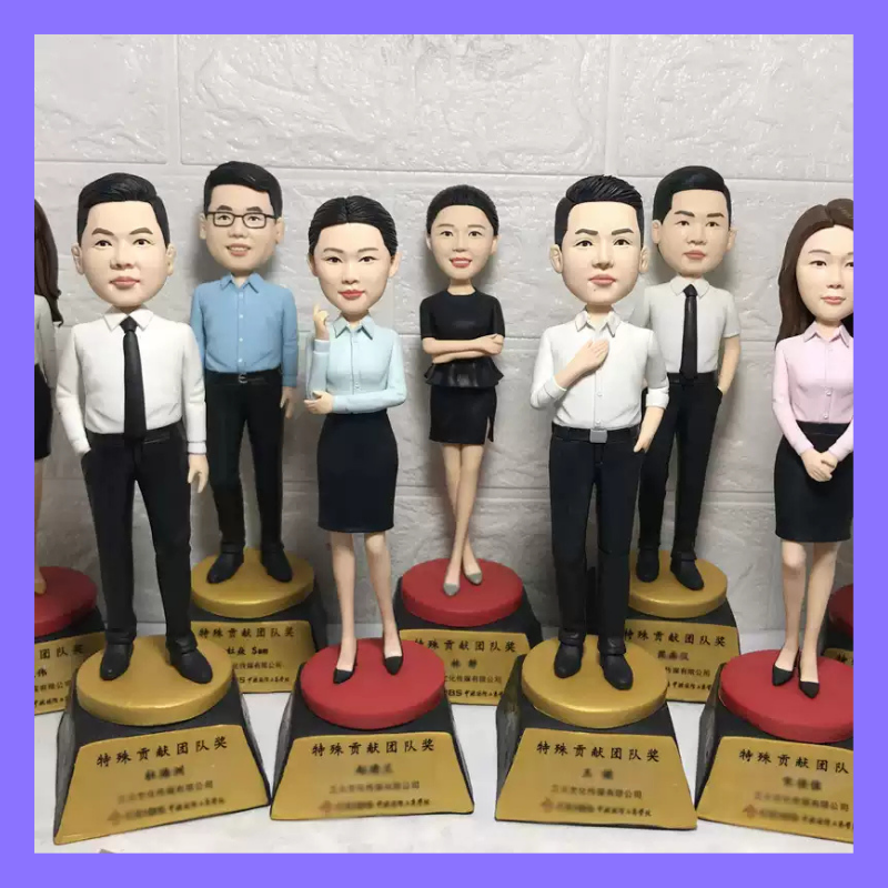 Set of bobblehead figures on stands with a plain background. Personalized couple present. Gift for boyfriend girlfriend. Custom-made. Personalized. Perfect gift idea. Meaningful keepsake. Wedding gift. Anniversary gift. Birthday gift