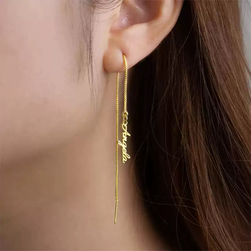 Gold threader earrings with engraved text worn by a person Stainless Steel Name Jewelry. Custom Gift-Personalized. gift for boyfriend / girlfriend. long-distance relationship gift meaningful keepsake. Memory gift. Christmas couple gift. Birthday Gift. Vertical Chain Threader Earrings