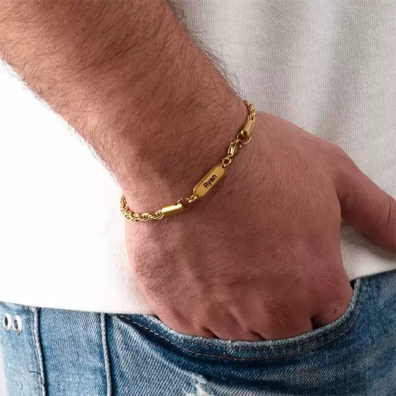 Gold bracelet on a wrist with a plain background. for man bracelet. Rope chain. Stainless Steel Name Jewelry. Custom Gift-Personalized. gift for boyfriend / girlfriend. long-distance relationship gift meaningful keepsake. Memory gift. Christmas couple gift. Birthday Gift. 