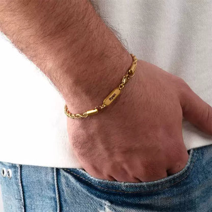Gold bracelet on a wrist with a plain background. for man bracelet. Rope chain. Stainless Steel Name Jewelry. Custom Gift-Personalized. gift for boyfriend / girlfriend. long-distance relationship gift meaningful keepsake. Memory gift. Christmas couple gift. Birthday Gift. 