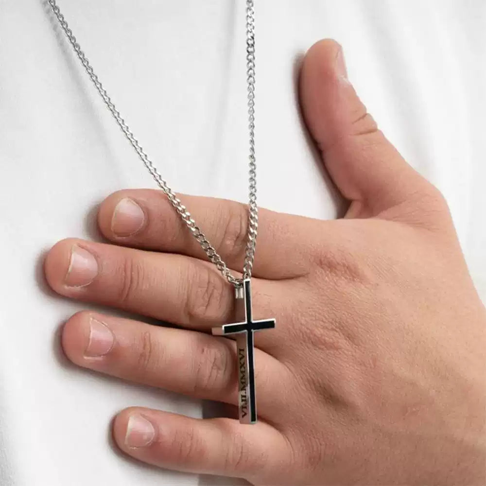 Hand holding a silver cross necklace against a white background . Stainless Steel Name Jewelry. Custom Gift-Personalized. gift for boyfriend / girlfriend. long-distance relationship gift meaningful keepsake. Memory gift. Christmas couple gift. Birthday Gift. Men’s Black Cross Name Necklace