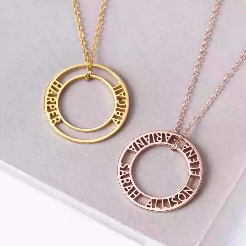 Two circular necklaces, one gold and one rose gold, on a light gray background. Stainless Steel Name Jewelry. Custom Gift-Personalized. gift for boyfriend / girlfriend. long-distance relationship gift meaningful keepsake. Memory gift. Christmas couple gift. Birthday Gift. Bubble Name Necklace