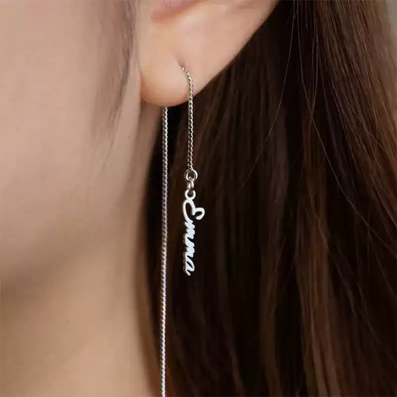 Silver chain earring with heart-shaped charm worn by a person Stainless Steel Name Jewelry. Custom Gift-Personalized. gift for boyfriend / girlfriend. long-distance relationship gift meaningful keepsake. Memory gift. Christmas couple gift. Birthday Gift. Vertical Chain Threader Earrings