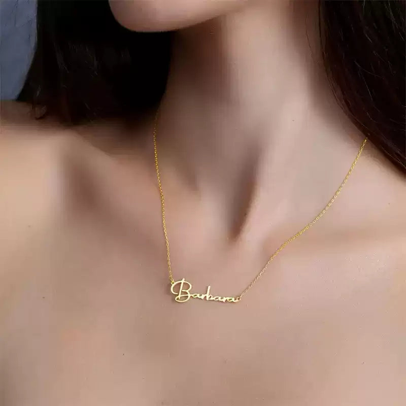 Gold necklace with 'Barbara' pendant on a person's neck. Stainless Steel Name Jewelry. Custom Gift-Personalized. gift for boyfriend / girlfriend. long-distance relationship gift meaningful keepsake. Memory gift. Christmas couple gift. Birthday Gift. Classic Name Necklace (Circle Chain)