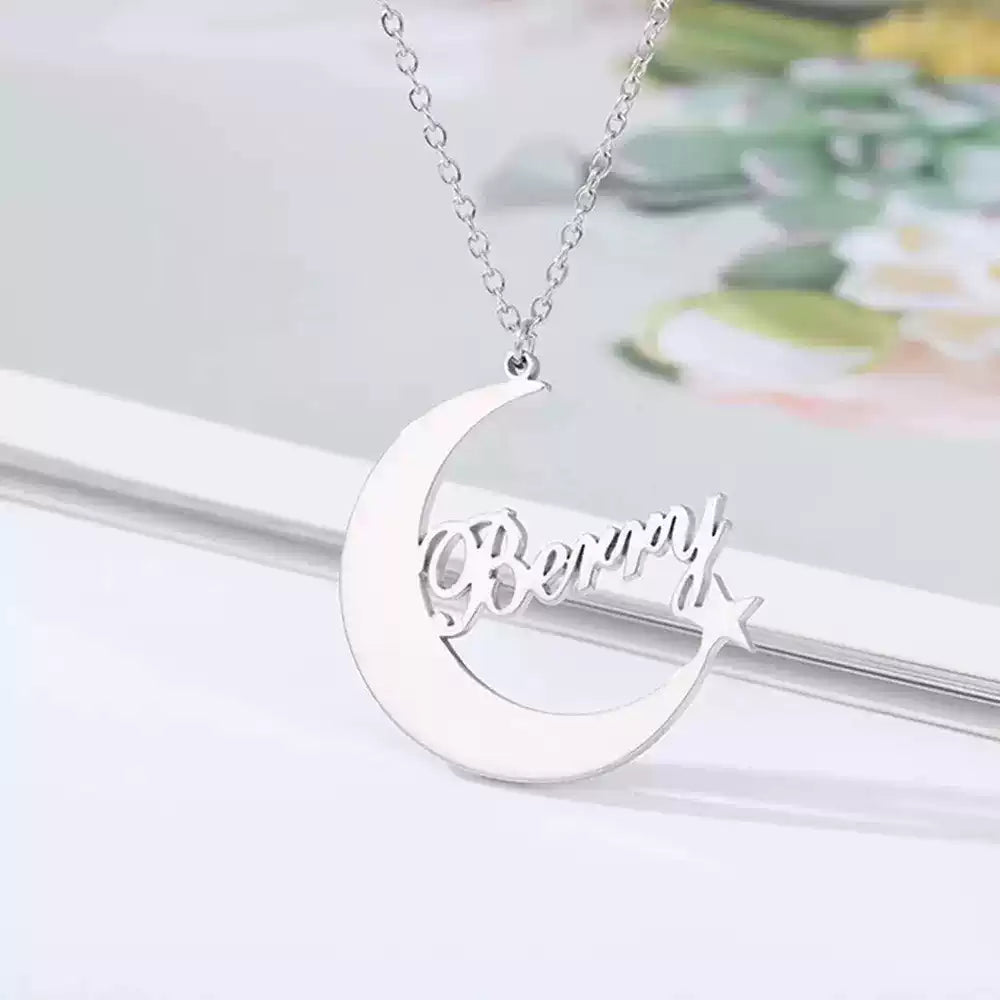 Silver necklace with a crescent moon pendant on a white background. Stainless Steel Name Jewelry. Custom Gift-Personalized. gift for boyfriend / girlfriend. long-distance relationship gift meaningful keepsake. Memory gift. Christmas couple gift. Birthday Gift. Moonlight Name Necklace