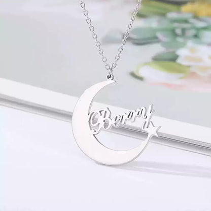 Silver necklace with a crescent moon pendant on a white background. Stainless Steel Name Jewelry. Custom Gift-Personalized. gift for boyfriend / girlfriend. long-distance relationship gift meaningful keepsake. Memory gift. Christmas couple gift. Birthday Gift. Moonlight Name Necklace