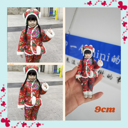 Child in a red traditional outfit with a toy version held in a hand, set against a light blue border with decorative elements. Personalized couple present. Gift for boyfriend girlfriend. Custom-made. Personalized. Perfect gift idea. Meaningful keepsake. Wedding gift. Anniversary gift. Birthday gift