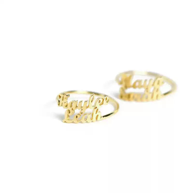 Two gold rings with engraved names on a white background Stainless Steel Name Jewelry. Custom Gift-Personalized. gift for boyfriend / girlfriend. long-distance relationship gift meaningful keepsake. Memory gift. Christmas couple gift. Birthday Gift.  