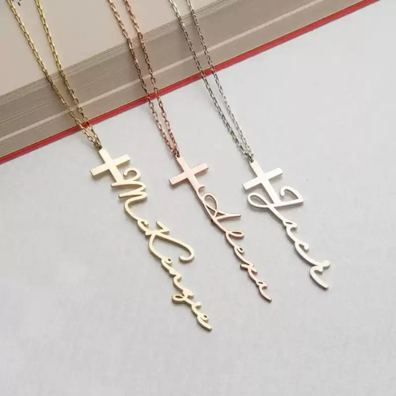 Three necklaces with different colored chains and script pendants on a light gray background. . Stainless Steel Name Jewelry. Custom Gift-Personalized. gift for boyfriend / girlfriend. long-distance relationship gift meaningful keepsake. Memory gift. Christmas couple gift. Birthday Gift. Cross Name Necklace