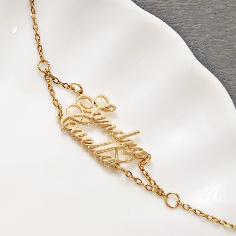 Gold necklace with 'Loving Mom' inscription on a white dish. Stainless Steel Name Jewelry. Custom Gift-Personalized. gift for boyfriend / girlfriend. long-distance relationship gift meaningful keepsake. Memory gift. Christmas couple gift. Birthday Gift. 