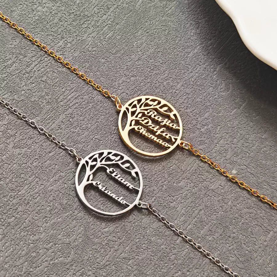 Two gold and silver bracelets with tree designs on a gray surface. Stainless Steel Name Jewelry. Custom Gift-Personalized. gift for boyfriend / girlfriend. long-distance relationship gift meaningful keepsake. Memory gift. Christmas couple gift. Birthday Gift. 