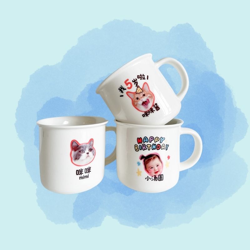 Three mugs with cartoon characters and text on a light blue background