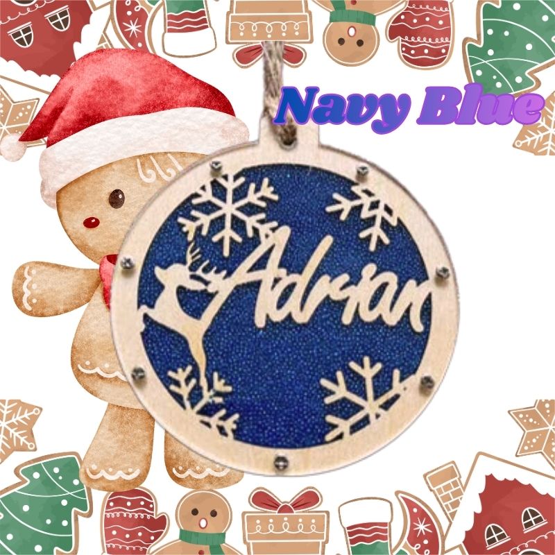 Navy blue ornament with 'Adrian' engraved, surrounded by Christmas-themed decorations. custom Christmas Gift