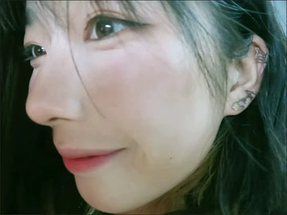 Close-up of a person's face with visible ear and hair. Stainless Steel Name Jewelry. Custom Gift-Personalized. gift for boyfriend / girlfriend. long-distance relationship gift meaningful keepsake. Memory gift. Christmas couple gift. Birthday Gift. Curved SoulName Earrings