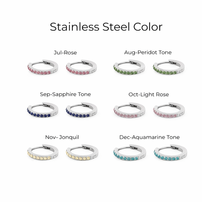 Stainless steel hoop earrings in various colors on a white background