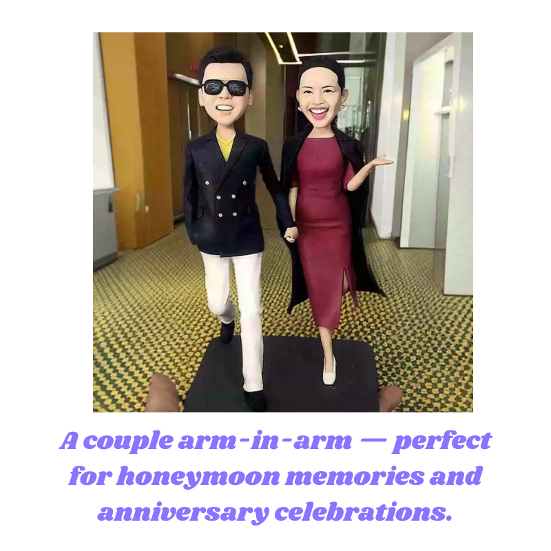 Statues of a man and woman figurines in formal attire standing arm-in-arm on a carpeted floor. Personalized couple present. Gift for boyfriend girlfriend. Custom-made. Personalized. Perfect gift idea. Meaningful keepsake. Wedding gift. Anniversary gift. Birthday gift